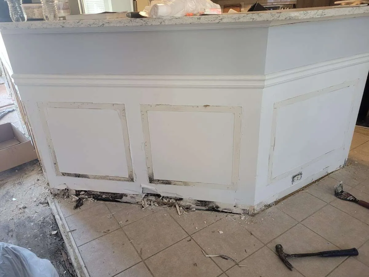 Water damage and mold on kitchen during Sewage Cleanup & Sanitation in Solvang